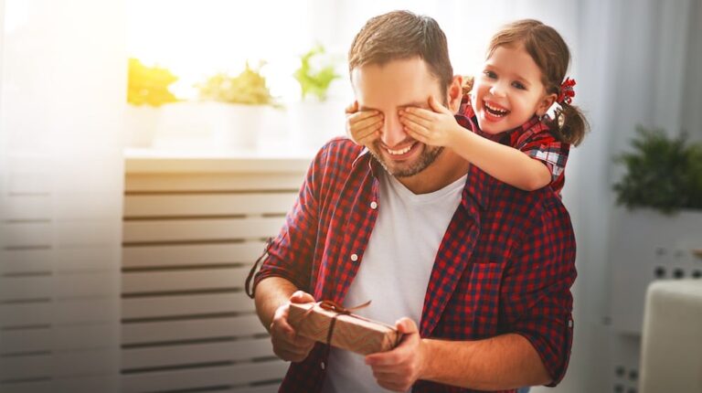 child giving gift to dad | Great DIY Gifts For Dad Who Wants Nothing This Father's Day | homemade fathers day gifts | featured