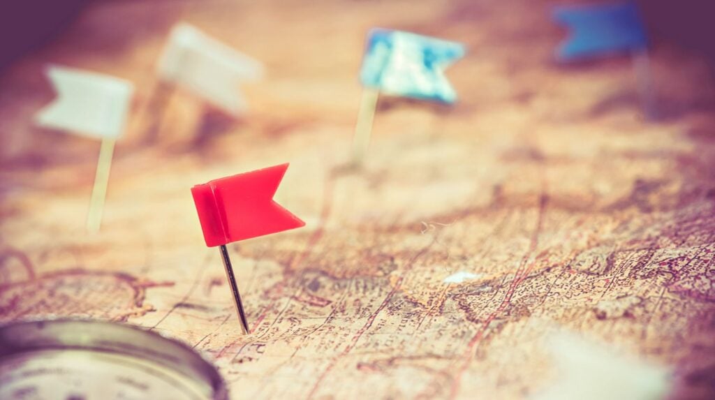 Columbus day and world map with compass | Uses For Old Maps | Inventive Ways To Repurpose Old Maps | Featured