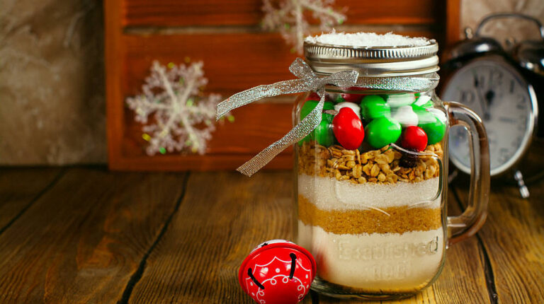 Cookies mix with color candies in a jar with paper tags | Mason Jar Cookie Recipes: How To Make M&M Cookies In A Jar | pint mason jar cookie recipes | Featured