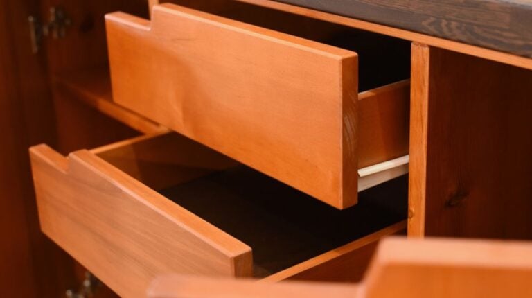 details-wooden-furniture-open-drawers | How To Refinish Cabinets To Make Them Look New Again | Featured