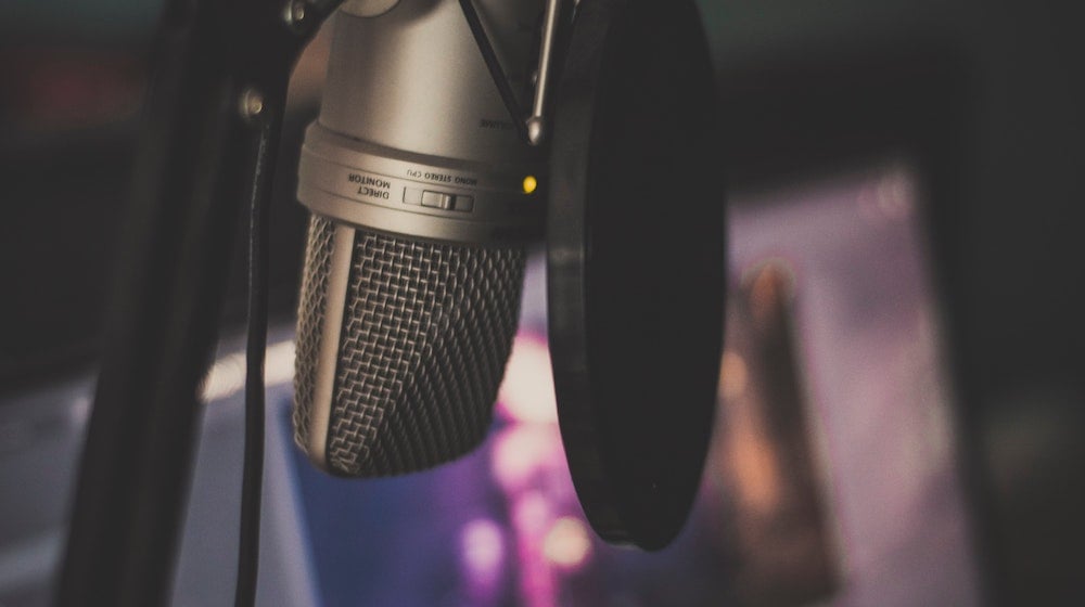 Focus photography of gray condenser microphone | Make A DIY Vocal Booth And How To Start Your Own Podcast | Featured
