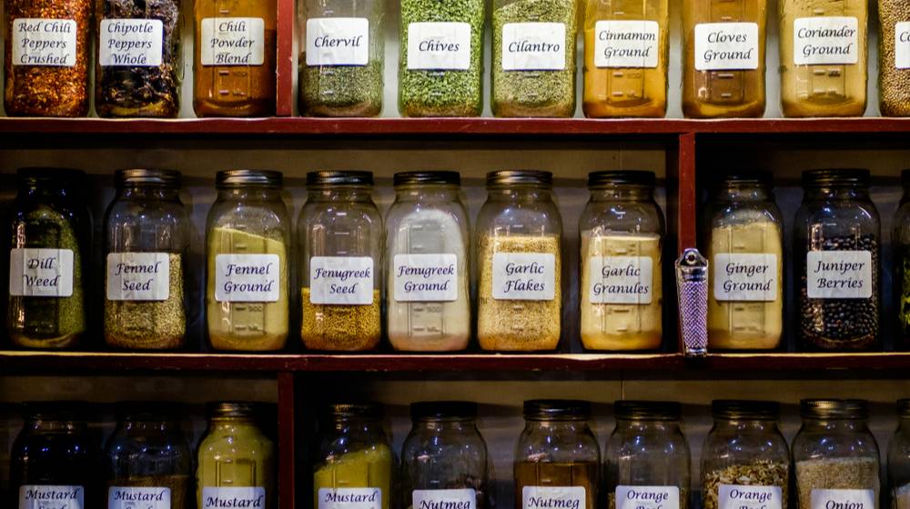 dried-spices-glass-jars-displayed-on | 17 DIY Organization Tips and Projects to Start Your Year | Featured