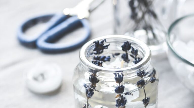 handmade-candles-lavender-on-textile-background |Soothing DIY Lavender Candles To Melt Your Stress Away | Featured