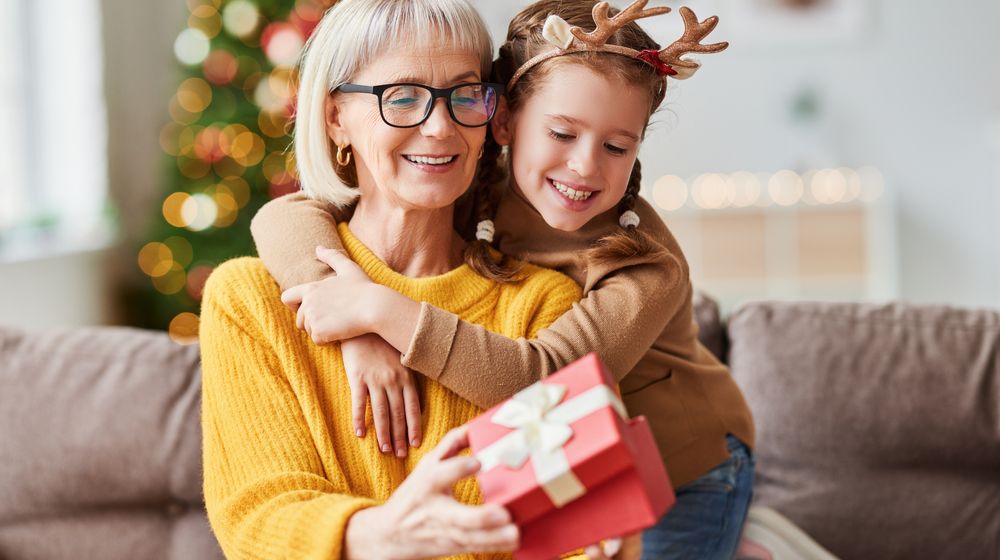 happy-family-on-christmas-morning-affectionate | DIY Christmas Gifts For Grandma | Featured