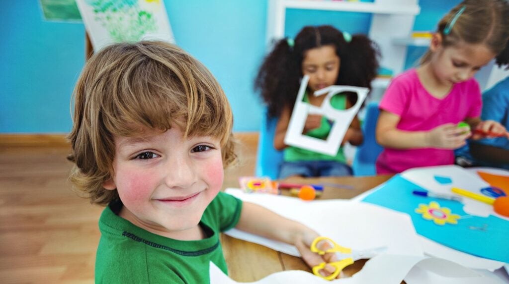 Feature | Happy kids doing arts and crafts together at their desk | Easy And Fun Summer Crafts | DIY Projects