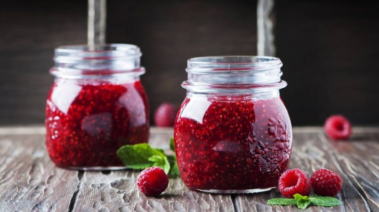 homemade jam raspberry on wooden table | DIY Raspberry Jam Recipe With No Pectin | Featured