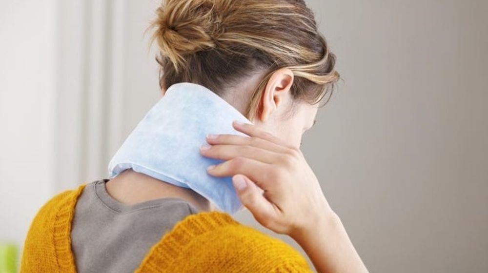 hot-therapy-woman| DIY Rice Heating Pad That Will Warm You Up This Winter | Featured
