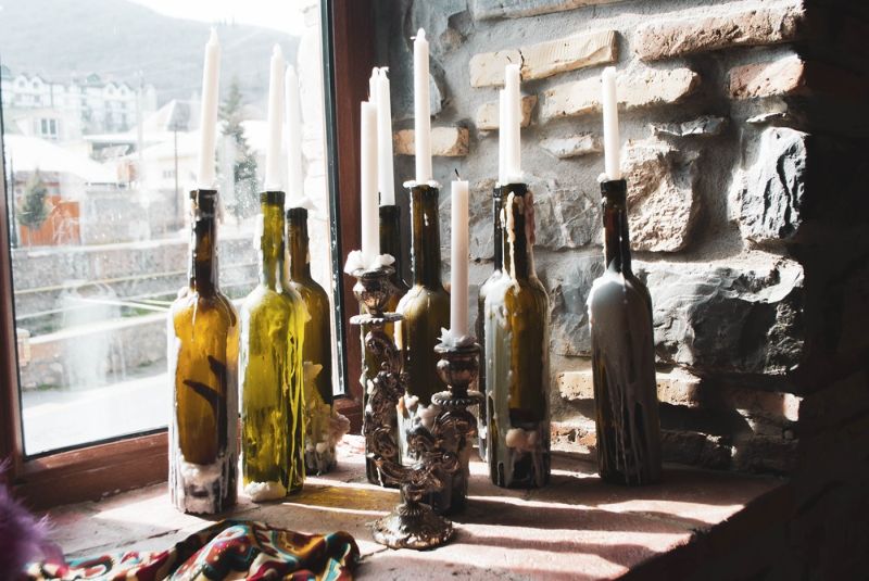 image-white-candles-glass-wine-bottles | candle holder