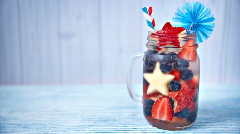 Feature | Patriotic drink cocktail with strawberry, blueberry and apple | 4th Of July Drink Recipes In Mason Jars To Mix At Home