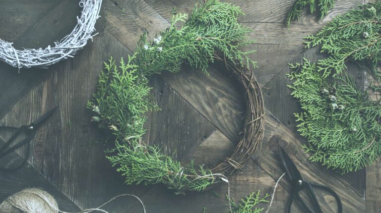 DIY wreath on table | Fall Door Decorations | DIY Wreaths, Door Hangers, And More | fall door decorations | fall door hangers | Featured