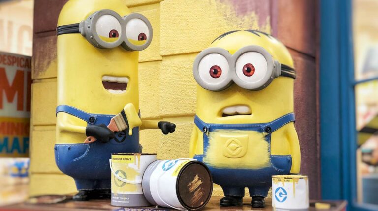 two minion character figures on red table | DIY Minions Costume Ideas You Have to Check Out | DIY Minions Costume | diy minion costume | Featured