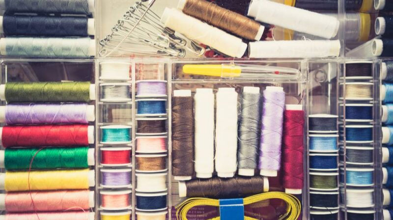 top-view-bright-colorful-threads-set | 7 Clever DIY Sewing Organizers That Will Leave You in Awe | featured