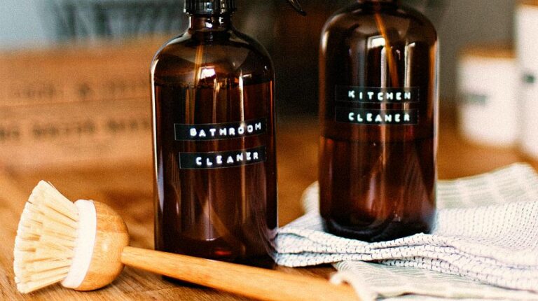 black spray bottle with brush | How To Make Your Own All Purpose Cleaner That Actually Works | Featured