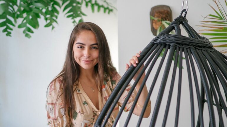 Woman standing near a hanging chair | Cool DIY Projects For Teen Girls | Featured