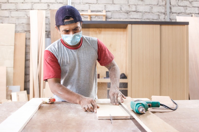 Worker at Carpenter Workspace Cutting the Wood Board Using Table Saw | DIY Table Saw