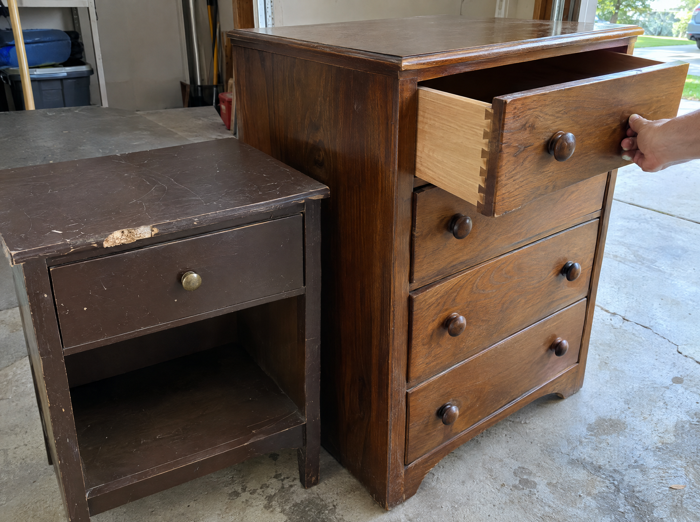 Worn thrift nightstand next to a solid wood dresser with dovetail drawer joints